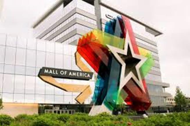 Picture of building with a large rainbow star 
